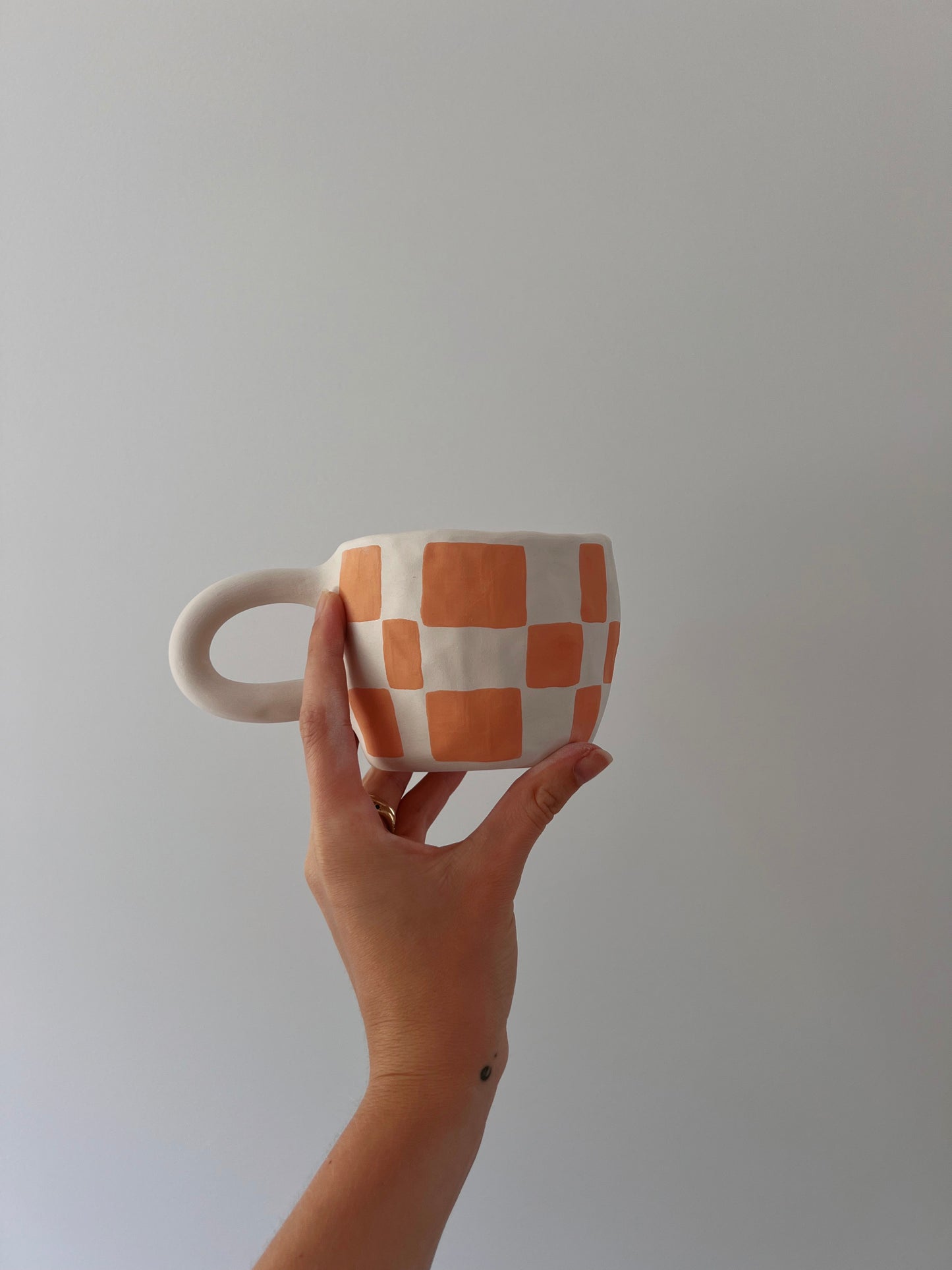 orange check mug