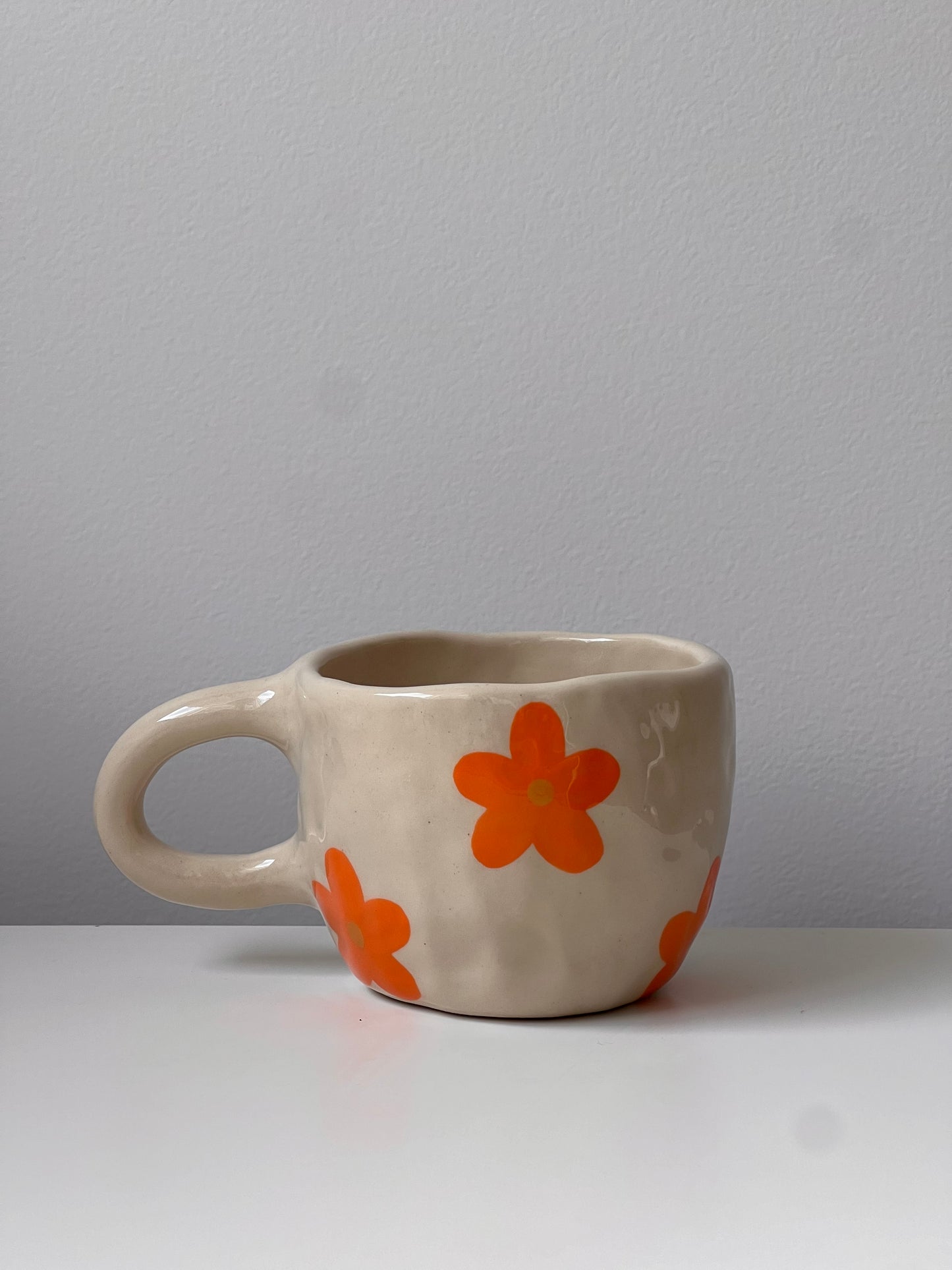 orange flower mug